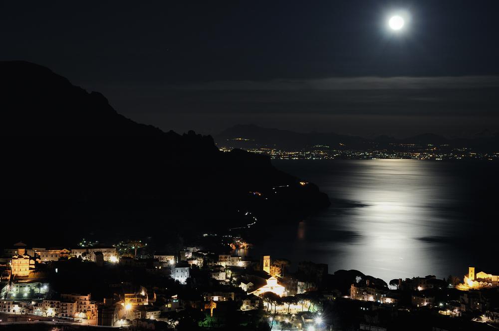 Panorama of Ravello at night with the Duomo and Piazza Vescovado in the center